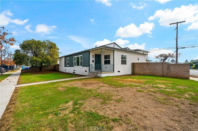 view of front of house with a front lawn