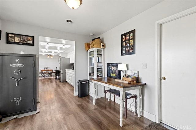 office space with hardwood / wood-style flooring