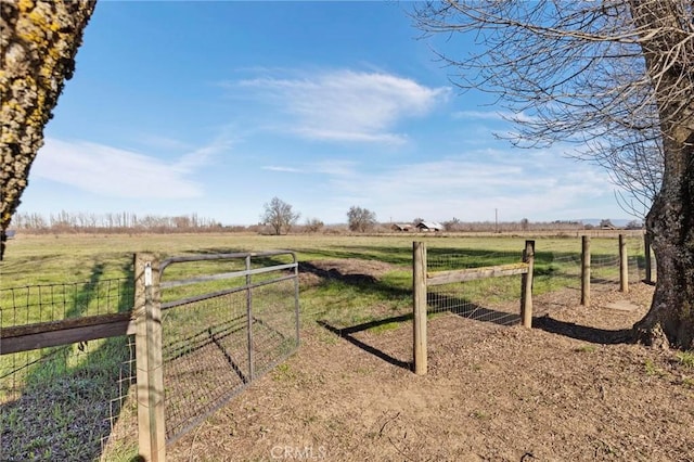 view of gate featuring a rural view