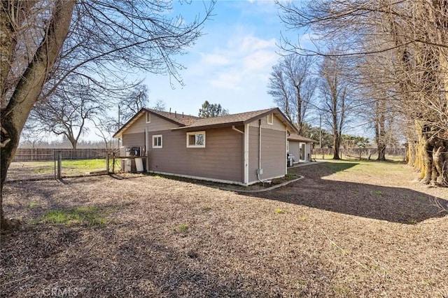 view of home's exterior with cooling unit