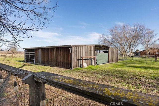 view of outdoor structure with a rural view