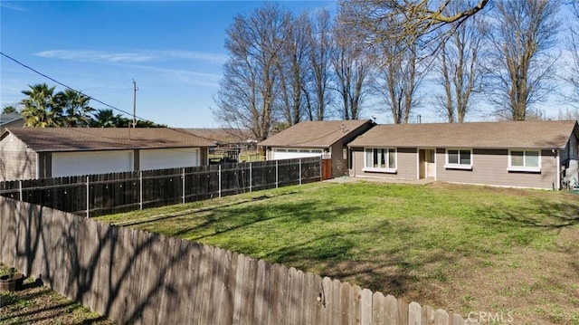 view of yard with a garage