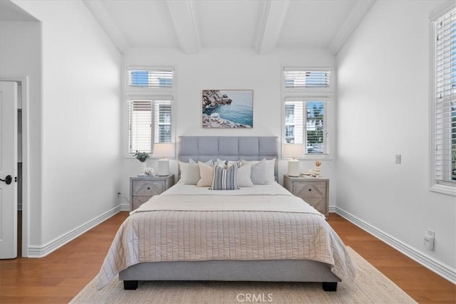 1612 Speyer Ln, Redondo Beach, CA 90278 - bedroom with beamed ceiling and wood finished floors