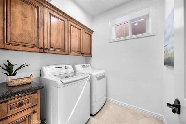 1612 Speyer Ln, Redondo Beach, CA 90278 - washroom with cabinet space, independent washer and dryer, and light tile patterned flooring