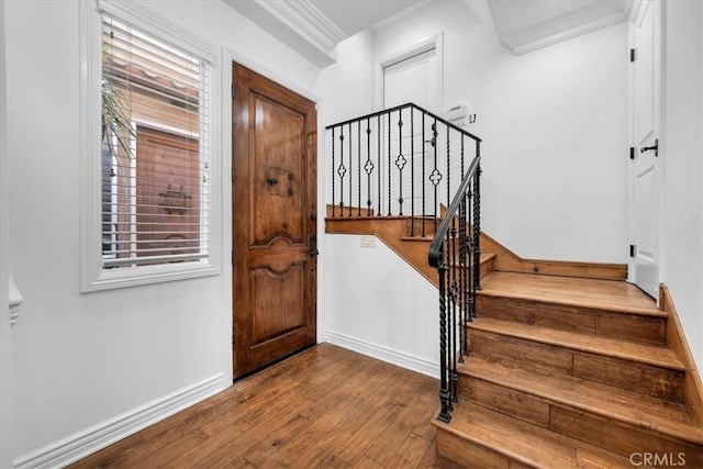1612 Speyer Ln, Redondo Beach, CA 90278 - entryway with wood finished floors, stairs, and crown molding