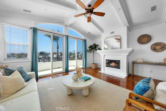 1612 Speyer Ln, Redondo Beach, CA 90278 - living room with wood finished floors, ceiling fan, plenty of natural light, a fireplace with flush hearth, and ornamental molding