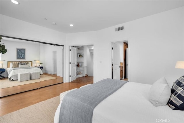 1612 Speyer Ln, Redondo Beach, CA 90278 - bedroom featuring wood finished floors, recessed lighting, and a closet