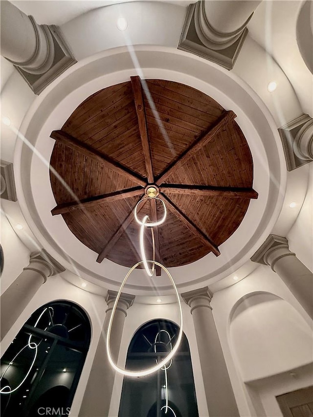 room details featuring wood ceiling and beam ceiling