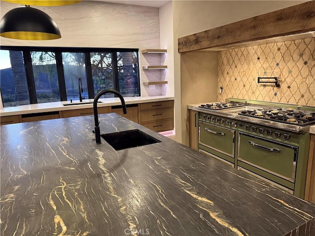 kitchen featuring backsplash and sink