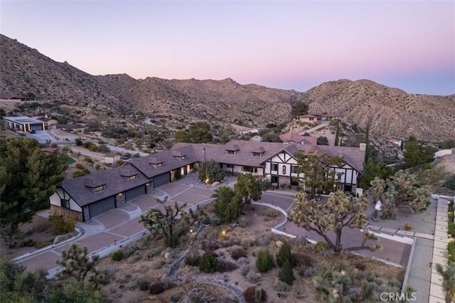 aerial view at dusk with a mountain view