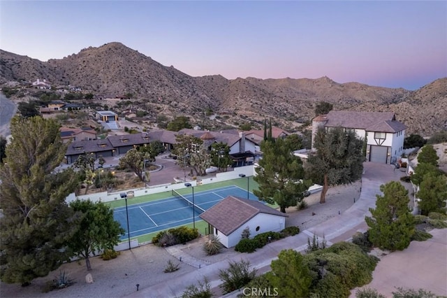 aerial view at dusk with a mountain view