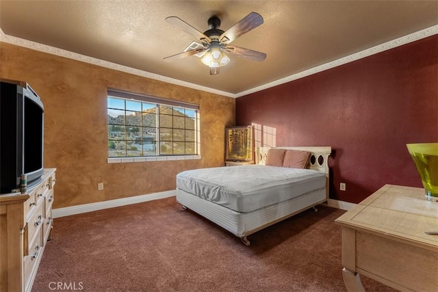 bedroom with ceiling fan, ornamental molding, and dark colored carpet