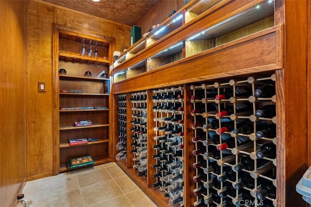 wine cellar with light tile patterned floors