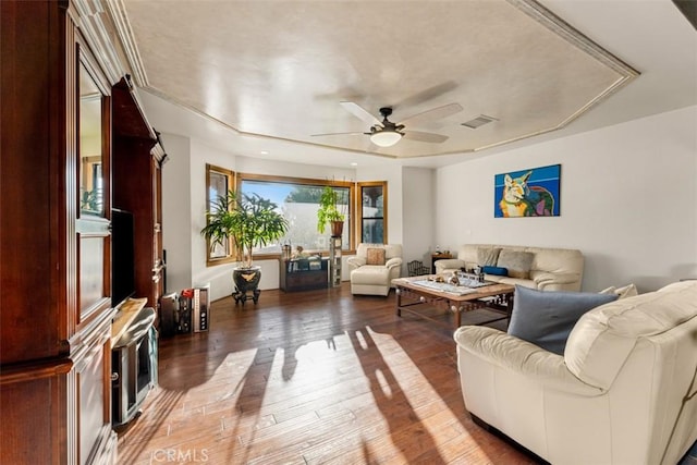 living room featuring ceiling fan and wood-type flooring