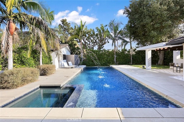 view of pool featuring a gazebo, pool water feature, and a patio