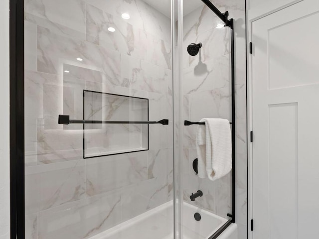 bathroom featuring enclosed tub / shower combo