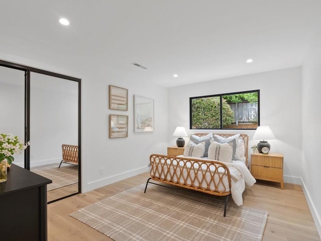 bedroom featuring light wood-type flooring