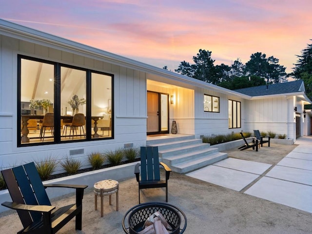 exterior space featuring a fire pit