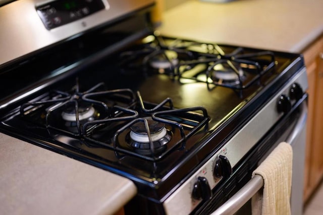 room details with stainless steel range with gas stovetop