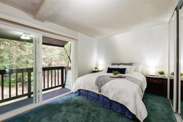 carpeted bedroom with a textured ceiling, access to outside, and beamed ceiling