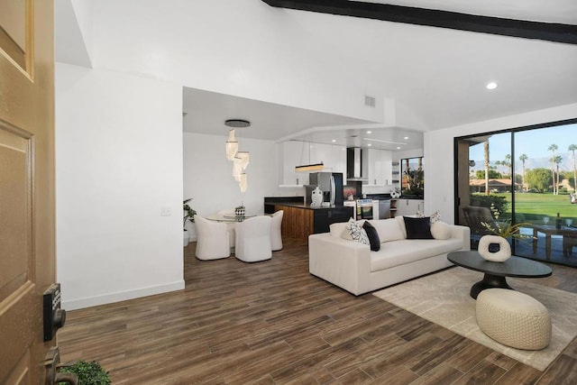 living room with beamed ceiling