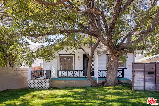 view of front of home with a front yard