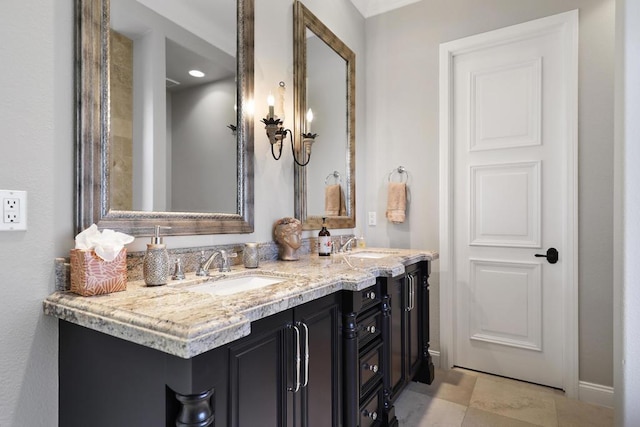 bathroom featuring vanity and tile patterned flooring