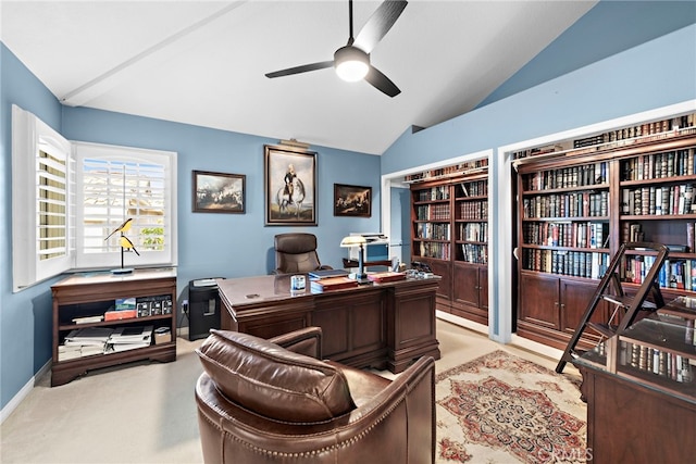 carpeted home office featuring ceiling fan and lofted ceiling