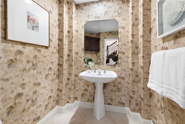 bathroom with tile patterned flooring