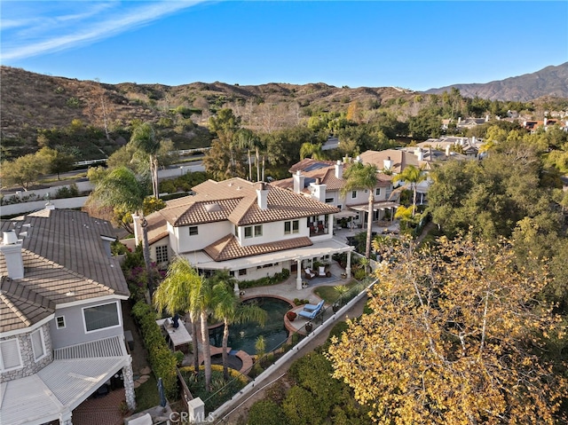 drone / aerial view featuring a mountain view