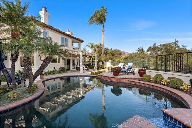 view of pool featuring a patio