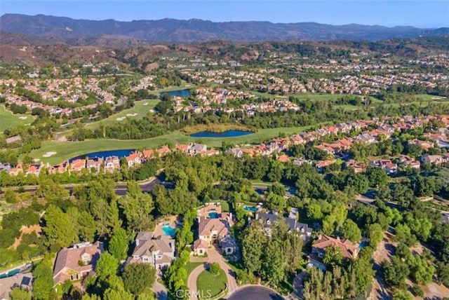 aerial view with a water and mountain view