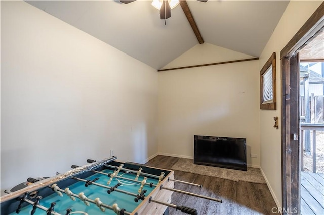 playroom featuring lofted ceiling with beams, wood-type flooring, a wealth of natural light, and ceiling fan