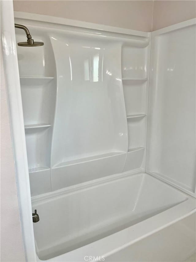 bathroom with shower / bathing tub combination