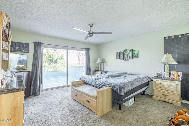 bedroom featuring ceiling fan, a textured ceiling, light carpet, and access to outside