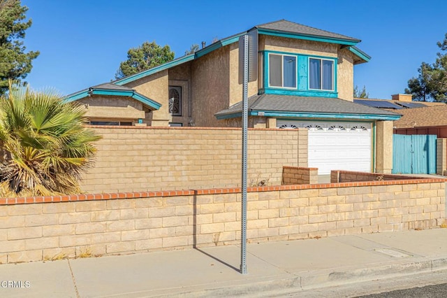 view of front of house with a garage