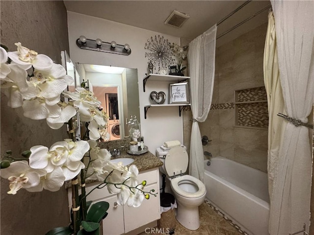 full bathroom with toilet, vanity, tile patterned flooring, and shower / bath combo with shower curtain