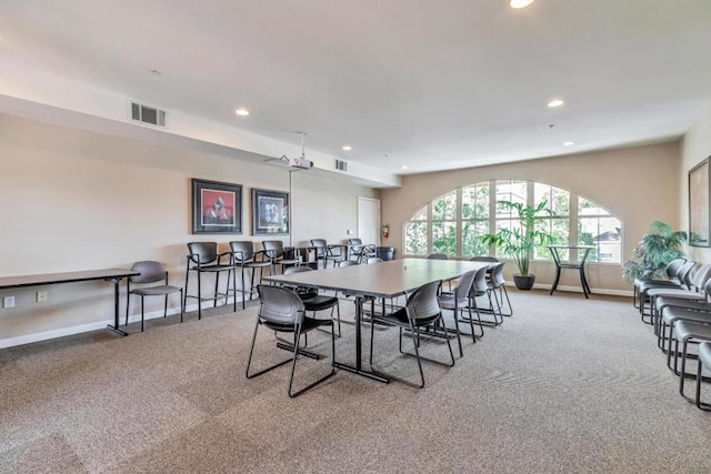 dining area with carpet