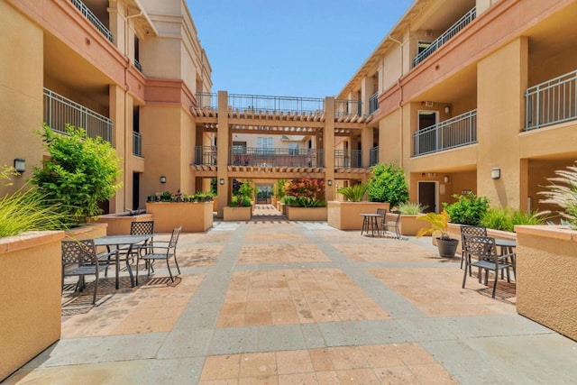 surrounding community with a patio