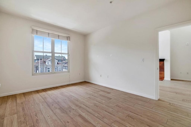 unfurnished room featuring light wood-type flooring