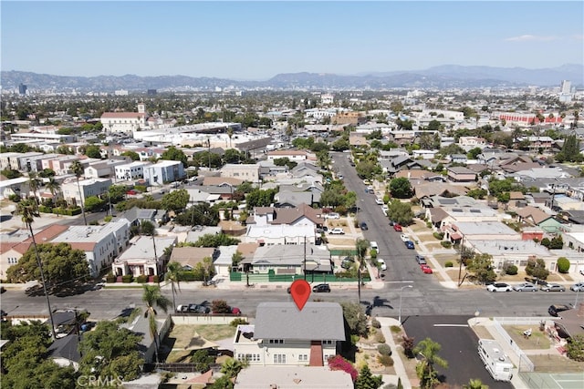 drone / aerial view featuring a mountain view