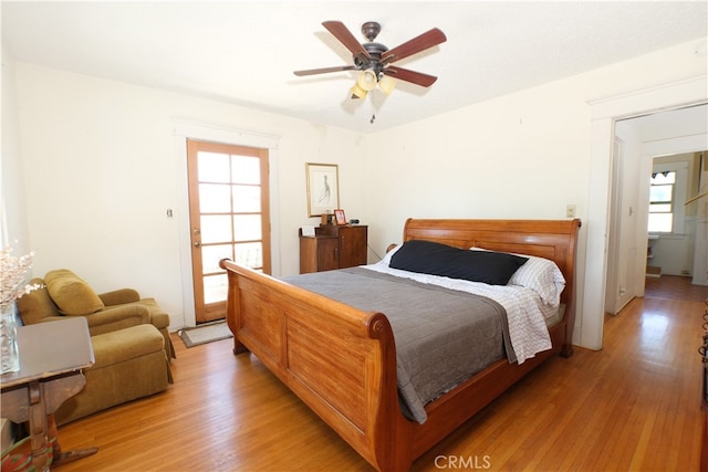 bedroom featuring ceiling fan and light hardwood / wood-style flooring