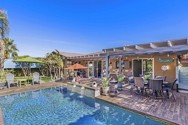 view of swimming pool with a wooden deck