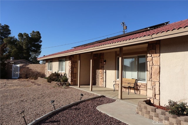 rear view of house with a patio