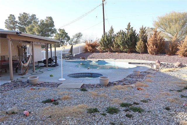 view of swimming pool featuring a patio