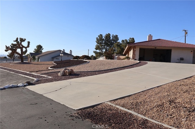 view of yard with a garage