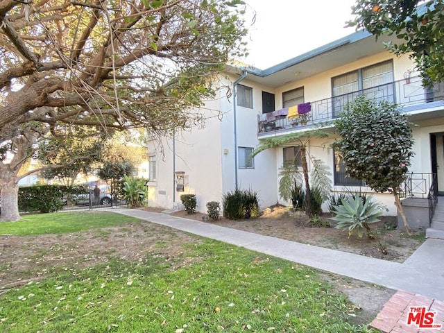 exterior space featuring a front lawn