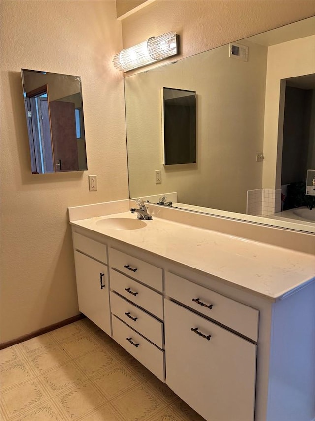 bathroom featuring vanity