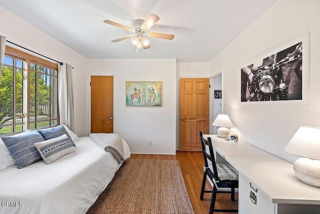 bedroom featuring ceiling fan and light hardwood / wood-style flooring