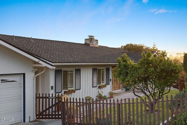 ranch-style home with a garage